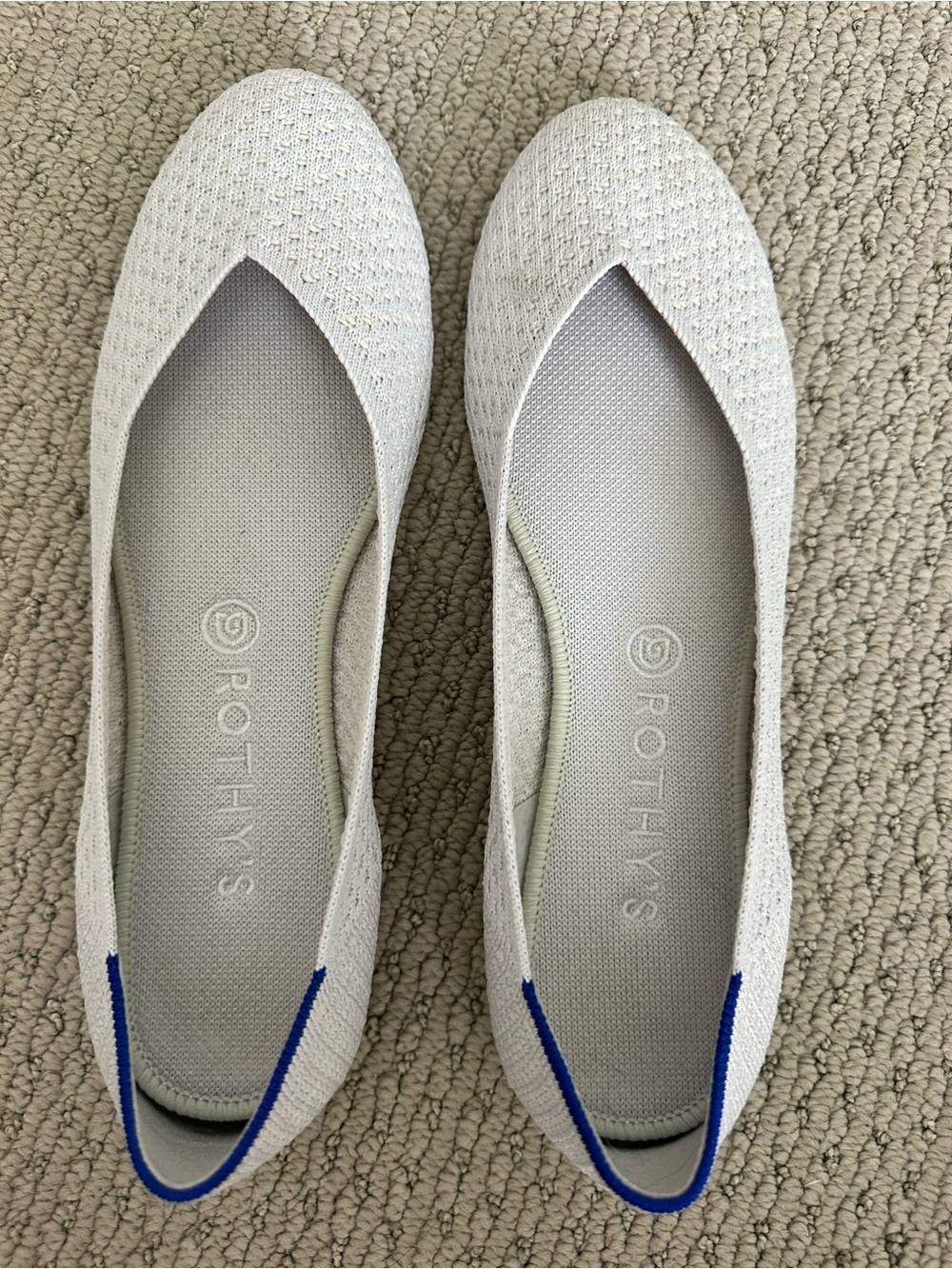 Rothy's Light white Pointed Ballet Flats with Blue Heel Trim
